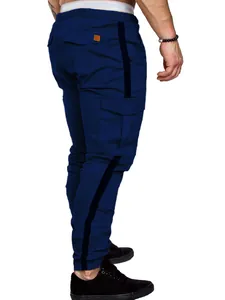 Back view of men's slim fit navy blue cargo pants with side stripes and pockets
