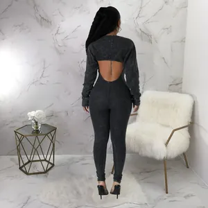 Detailed back view of a sexy black acid wash backless ribbed knit jumpsuit set for women