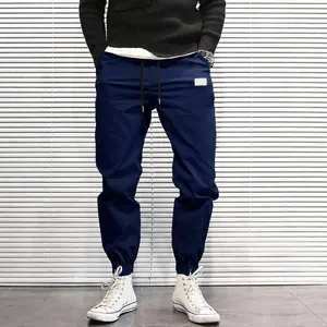 Men's stylish navy blue casual cargo joggers with drawstring waist and elastic cuffs