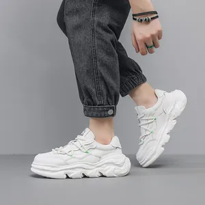 Premium white leather chunky sneakers with a unique dissolving thick sole for men.