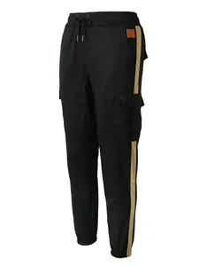 Detailed view of men's cargo pants featuring side stripes and multiple utility pockets.