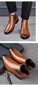 Detailed view of brown leather Chelsea boots for men featuring a classic British style design