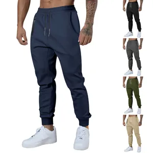 Detailed view of men's drawstring joggers in multiple colors showing zippered pockets