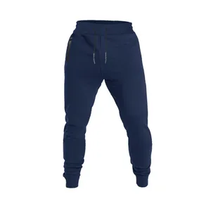 Close-up detail of navy blue men's joggers with drawstring waist and zipper pockets