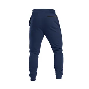 Detailed back view of navy blue men's joggers with zipper pocket and ribbed cuffs