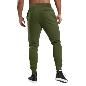 Detailed back view of men's olive green joggers with zipper pocket and elastic cuffs