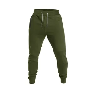 High-quality detail of men's olive green drawstring joggers featuring a side zipper pocket