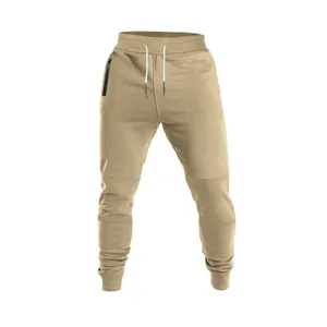 Detailed view of khaki men's joggers with white drawstrings and side zipper pocket