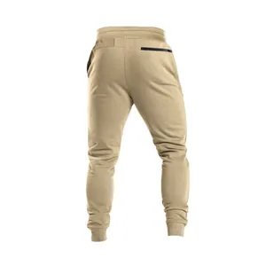 Back view detail of khaki men's joggers showing zipper pocket and ribbed cuffs
