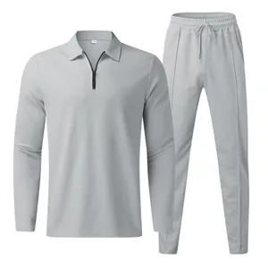 Detail of waffle knit texture on grey two-piece men's casual polo and joggers set
