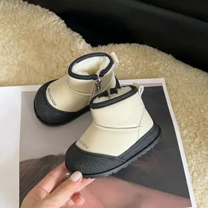 Close-up of warm plush lining and side zipper detail on beige toddler snow boots