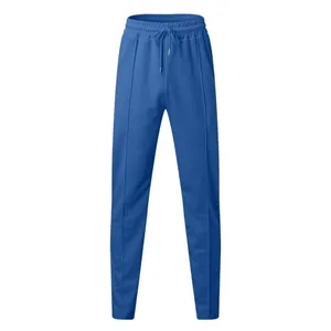 Detailed view of men's blue waffle knit sports trousers with drawstring waist.