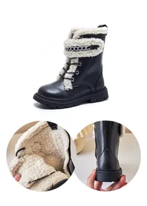 Warm children's Martin boots with fleece lining and decorative metal chain detail.