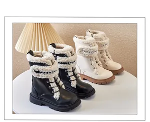 Children's warm winter boots featuring cozy faux shearling trim and stylish metal chain detail