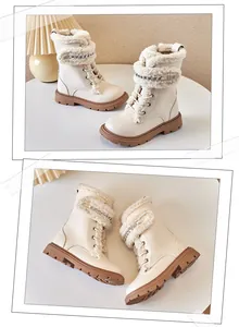 Detail view of children's fleece-lined Martin boots with chain and wool trim