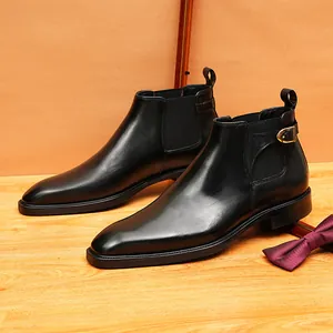 Bottines Chelsea élégantes en cuir noir pour hommes avec bout pointu et boucle latérale