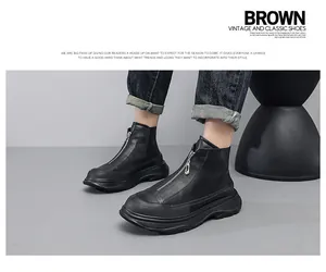 Detail of black men's platform leather boots with front zipper design