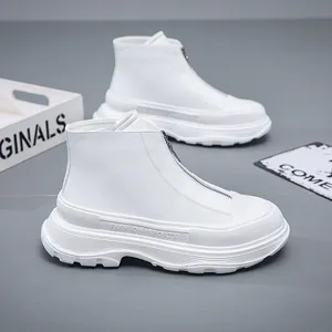 Modern white designer platform boots featuring a front zipper and chunky soles for men