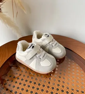 Fleece-lined toddler walking shoes with velcro strap in beige and grey