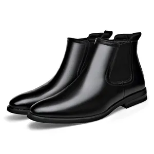 Classic black leather Chelsea boots for men featuring pointed toe and elastic panels