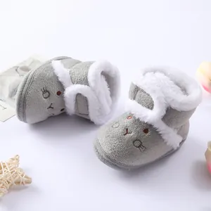 Grey baby winter snow boots with cute rabbit embroidery and warm fur lining detail.