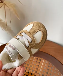 Winter warm toddler walking shoes featuring soft plush lining and camel suede details