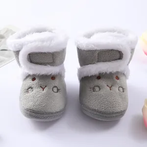 Front view of grey baby winter boots with white faux fur lining and cute embroidery