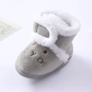 Detail view of soft grey baby winter boots featuring fluffy white trim and cute embroidery