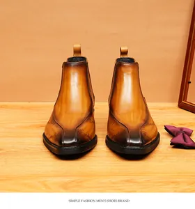 Elegantes botines Chelsea de cuero genuino marrón frotado a mano con punta fina para hombres