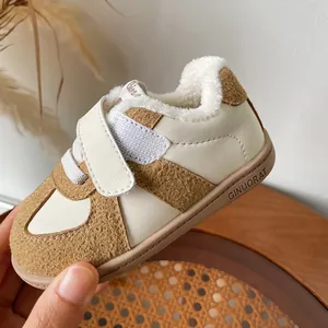 Warm winter toddler sneakers with thick faux fur lining and easy velcro strap closure