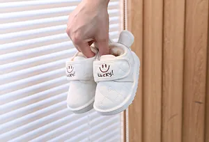Soft off-white children's winter snow boots with plush lining and Lucky embroidery detail