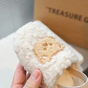 Scarpe primi passi per neonati in peluche crema con ricamo a forma di orsetto