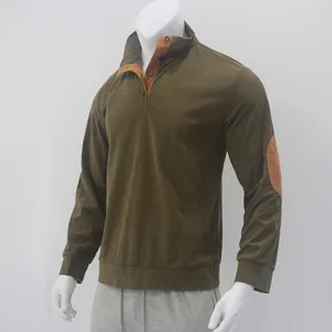 Close-up of olive green corduroy sweatshirt with button collar and brown elbow patches