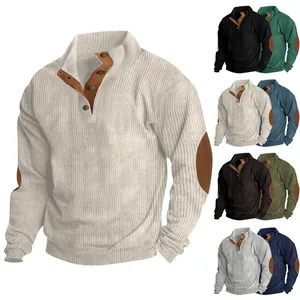 Detail view of men's corduroy sweatshirt with buttoned stand collar and elbow patches
