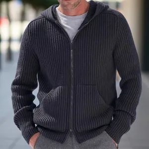 Close-up of texture on a men's dark charcoal ribbed knit zip-up hooded cardigan jacket.