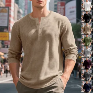 Men's long sleeve Henley shirt with waffle knit texture and button neck in various colors.