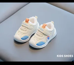White toddler winter walking shoes with warm fleece lining and waterproof leather.