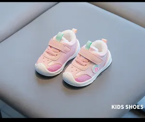 Detail view of pink winter velvet baby shoes featuring waterproof leather and soft soles