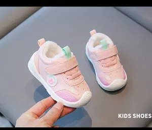 Close-up of pink winter fleece-lined toddler walking shoes with waterproof leather