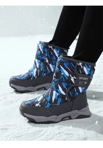 Detail showing children's warm fleece-lined camouflage snow boots with anti-slip soles