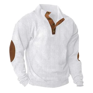 Detail view of white ribbed corduroy sweatshirt with button collar and elbow patches.