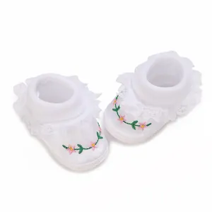 Elegant white baby princess shoes with delicate floral embroidery and soft lace trim