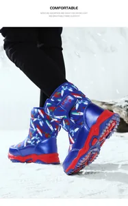 Outdoor children's high-top snow boots with non-slip red soles in a snowy scene