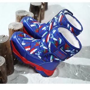 Side view of blue patterned children's snow boots with warm white fleece lining