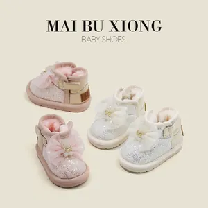 Elegant princess style baby girl snow boots with warm plush lining and decorative bow detail