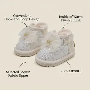 Glittery princess-style toddler snow boots with mesh bow and warm fleece lining for winter