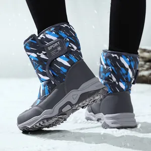 Children's waterproof high-top snow boots with blue camouflage pattern on snow ground