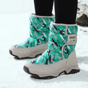 Waterproof winter snow boots for kids with green graffiti pattern and non-slip rubber soles