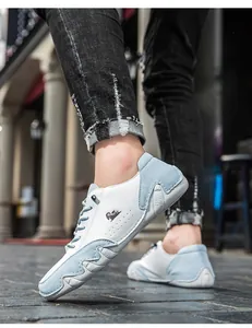 Close-up of low-top casual shoes with octopus sole in blue and white