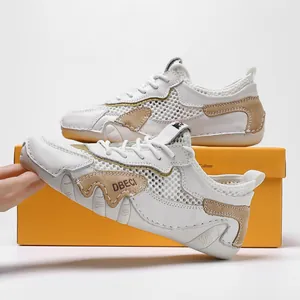 Zapatillas de exterior de malla transpirable blancas y beige con diseño casual bajo